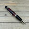 Pinecone pen with gold pen components 
