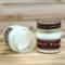 Cool mint and creamy vanilla in 8oz mason jar. One jar standing up with lid on and one jar on its side with lid off.
