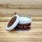 Lavender and rosemary scented soy candle in 6oz tin with lid off.