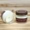 Gingerbread scented soy candle in 4oz jar. One jar standing up with lid on and one jar on its side with lid off.