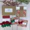 A handmade Christmas card kit with plaid scrapbook paper, cardstock, stamped sentiment, crochet bow embellishment and envelope for 6 cards.