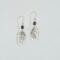 Handmade 2-inch dangle earrings with textured pewter oval drops and small freshwater pearl beads on argentium silver hooks.
