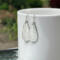 Hammered sterling silver teardrop dangle earrings by MariesGems.