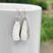 Hammered sterling silver teardrop dangle earrings by MariesGems.