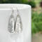 Hammered sterling silver teardrop dangle earrings by MariesGems.