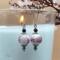 Vintage-style earrings with pink floral lampwork glass beads and silver hooks