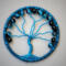 Handmade vibrant lue Tree of Life home decor with crackle glass beads, wire branches, and a yarn-wrapped hoop.