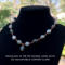 Moss agate beads in shades of teal, green and blue are linked by wire wrapping to form a necklace with copper clasp. 