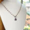 Taupe pearl and amethyst necklace with front toggle clasp in sterling silver by MariesGems.