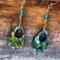 Abalone shell earrings with light reflecting color display