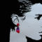 Face silhouette with purple to red blend triangle earrings