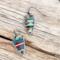 pretty non identical dangle western earrings