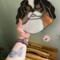 Japanese Chin Stained Glass Suncatcher- being held for size reference.