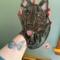 Mudi Stained Glass Suncatcher- black- being held for size reference.