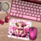 Personalized desk accessory with cow design with pink keyboard, mouse and headset sitting on the desktop.

