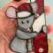 Christmas Mouse stained glass suncatcher. Made with gray, pink, white and red glass. Crystal eyes, nose and hat pom-pom.