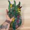 Dragon by Robin C. Hary being held for size reference.