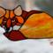Fox Stained Glass Suncatcher by Robin C. Hary made in shades of red, orange, yellow, cream, and white glass. Hanging in full sunlight.