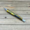 Black and yellow wood handled craft knife