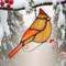 Female Cardinal Stained Glass Suncatcher by Robin C. Hary, made of rust, and light amber glass. Accented with crystals and copper wire.