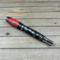 Real Texas Tech watch parts on carbon fiber rollerball pen