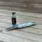 Black Texas Tech watch face rollerball pen