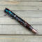 Kingman Turquoise and Copper Penny swirled resin rollerball pen