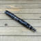 Hand cast coffee bean rollerball in gray resin