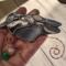 Hummingbird Stained Glass Suncatcher- sitting- being held for size reference.