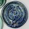Blue Suede:
Royal blue ceramic finger labyrinth with metallic sparks, handmade for mindfulness and stress reduction. Interior photo. 