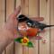 Robin Stained Glass Suncatcher by Robin C. Hary- being held for size reference.
