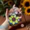 Moonbeam Stained Glass Suncatcher by Robin C. Hary- being held for size reference.