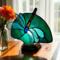 Dragonfly Stained Glass Fan Lamp by Robin C. Hary shown with white wings and green background.