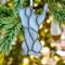Ornaments by Robin C. Hary- gray- shown hanging on a Christmas tree.