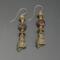 Handmade brass owl earrings with faceted petrified wood beads and gold-filled wires.