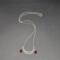 Handmade silver crescent moon phase necklace with red crystal teardrops on chain.