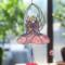 Angel stained glass wind chime- pink dress with blonde hair and white wings.