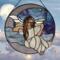 Angel on the Crescent Moon stained glass panel, a pale purple moon with purple blue sky and light blue/white clouds- the angel is dressed in a white dress, wings are made of iridescent and clear glass, her hair is rich brown color and falls to her waist. Skin color is fair.