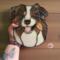 Australian Shepherd stained glass suncatcher being held for size reference. Approximately 9.5" x 8".