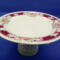 This decorative dish stand is ready to be used to serve goodies or hold your jewelry. It's 9 inches wide by 5 inches high.