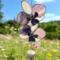 Orchid stained glass wind chime- shown in purple and white.