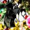 Schnauzer stained glass ornament- Black with natural ears hanging in a Christmas Tree.