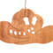 Handmade wooden Christmas tree ornament shaped like a cowboy hat, featuring a sprig of holly tucked into the hat band, star-shaped leaf cutouts, and round berry accents.