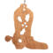 Handmade wooden Christmas tree ornament shaped like a cowboy boot, featuring a sprig of holly On the side of the boot, and round berry accents.