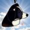 Border Collie stained glass ornament shown in Black and White.