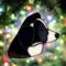 Border Collie stained glass ornament shown in Black and White- hanging on a Christmas Tree.
