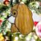 Cavalier King Charles Spaniel stained glass ornament shown in Blenheim hanging from a Christmas tree.