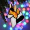 Corgi stained glass ornament shown hanging on a Christmas tree.