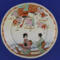Looking from the top down. The double row of pearls edge the plate very well.