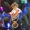 A handcrafted wooden Christmas tree ornament shaped like a wrapped candy, featuring intricate Victorian fretwork with twisted ends and a diagonal swirling stripe in the center.